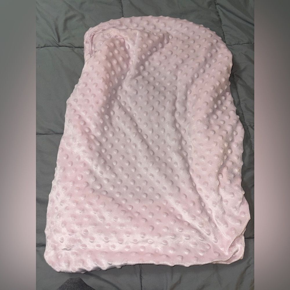 The peanut shell pink Minky changing table cover